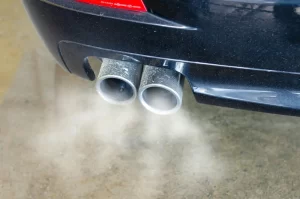 Image of fossil fuel exhaust emissions from car