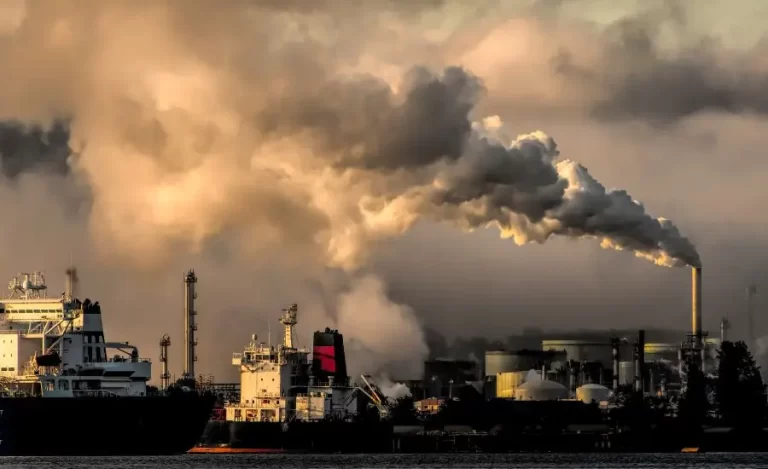 Image of fossil fuel emissions from combustion at factories.