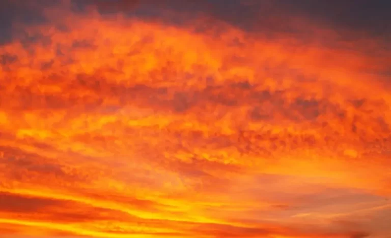 Image of a red, clouded sky