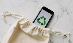 Image of mobile phone displaying a circular arrow pattern, representing circular economy