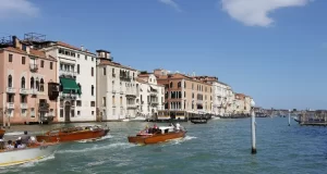 Image of boat travel along a canal