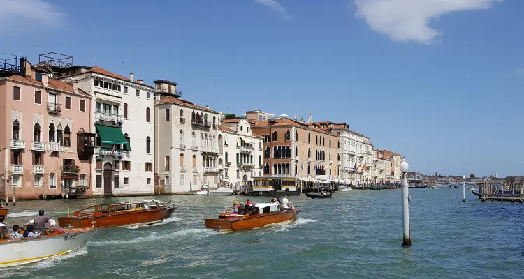 Image of boat travel along a canal